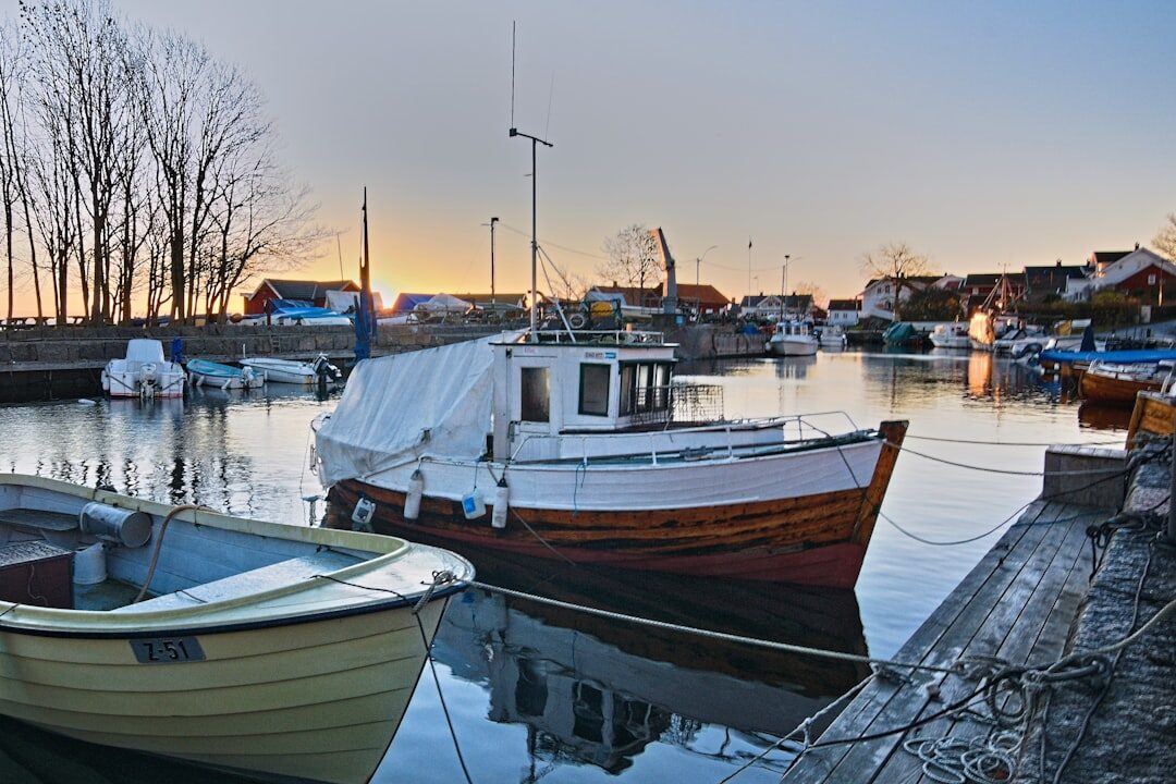 Danish fishing village harbour at dawn with wooden boats