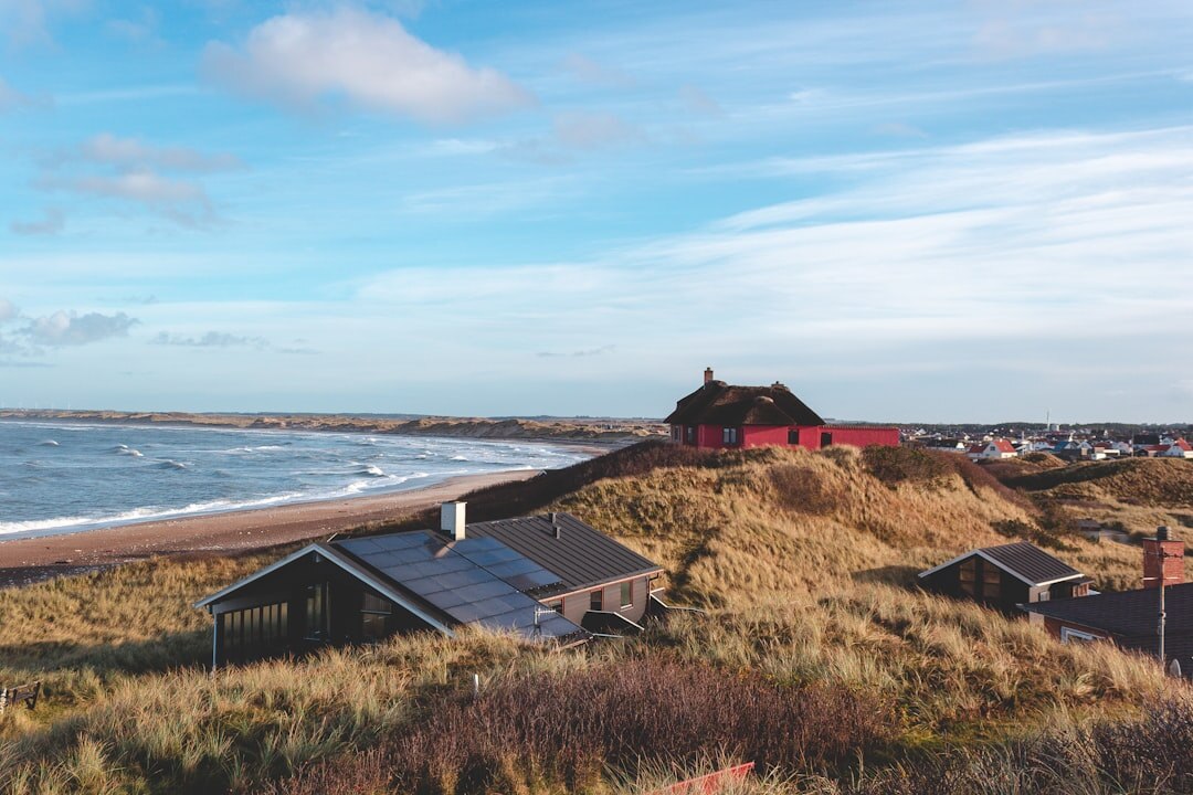 photographer with camera in danish village