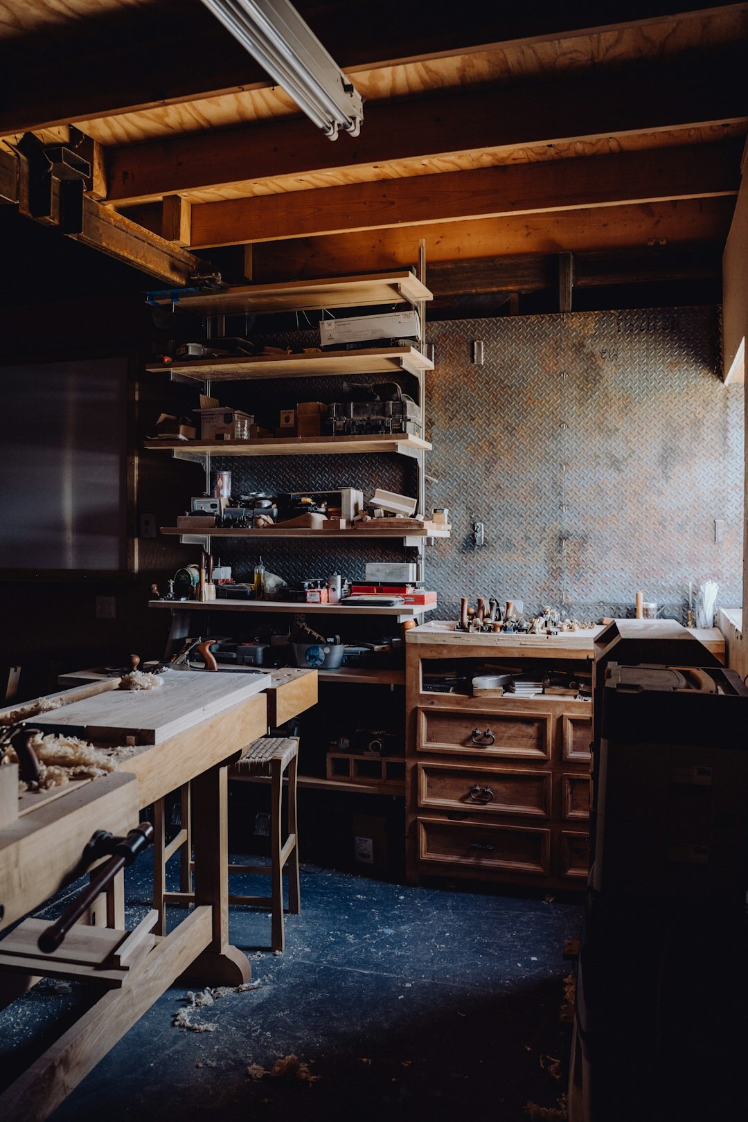 Danish craftsman working with wood in a small workshop