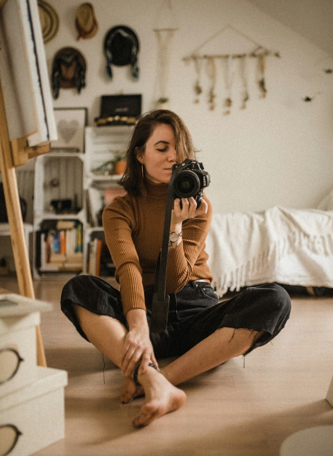 photographer reviewing photos with subject